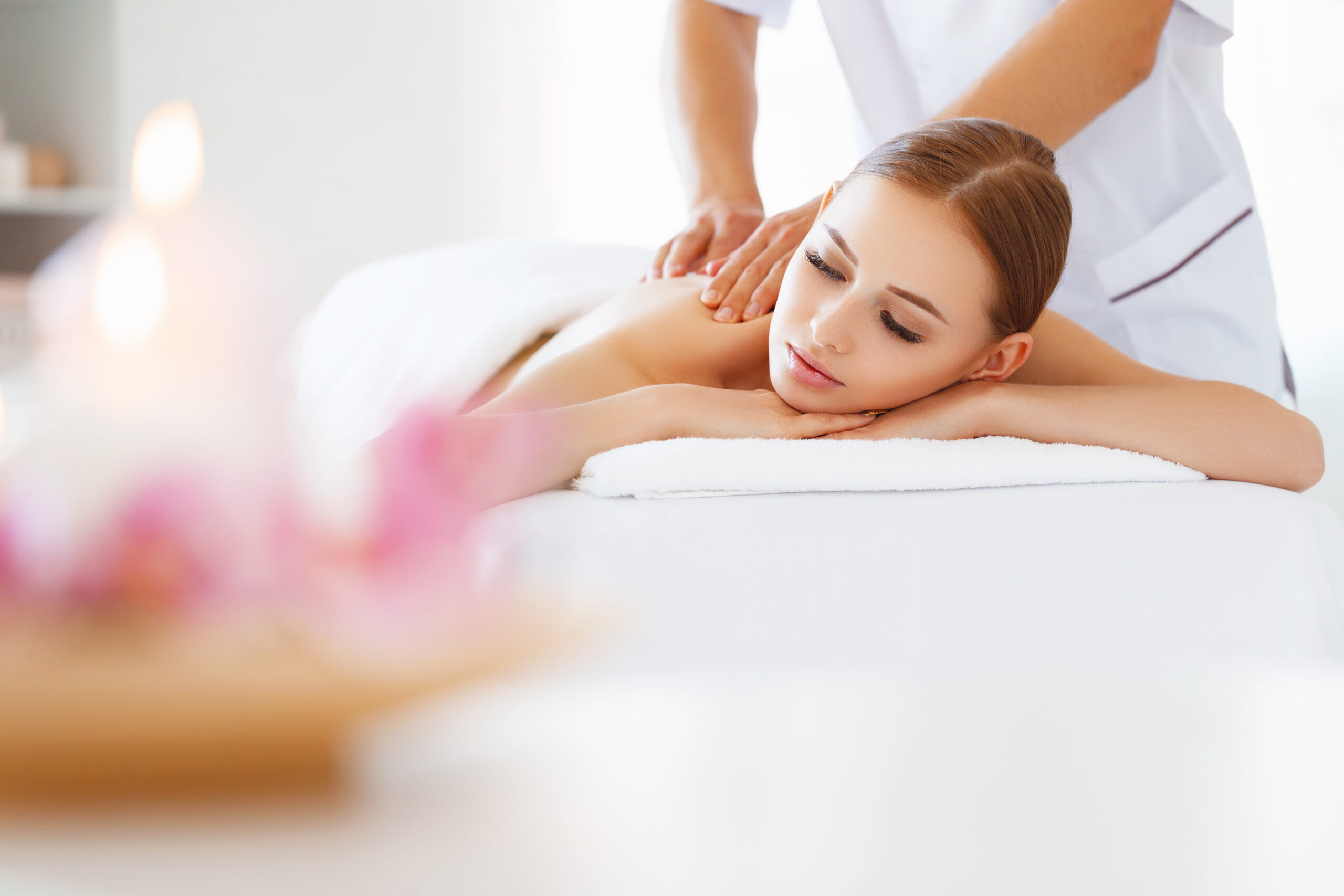beautiful girl enjoys massage and spa treatments a beautiful girl enjoys massage and spa treatments